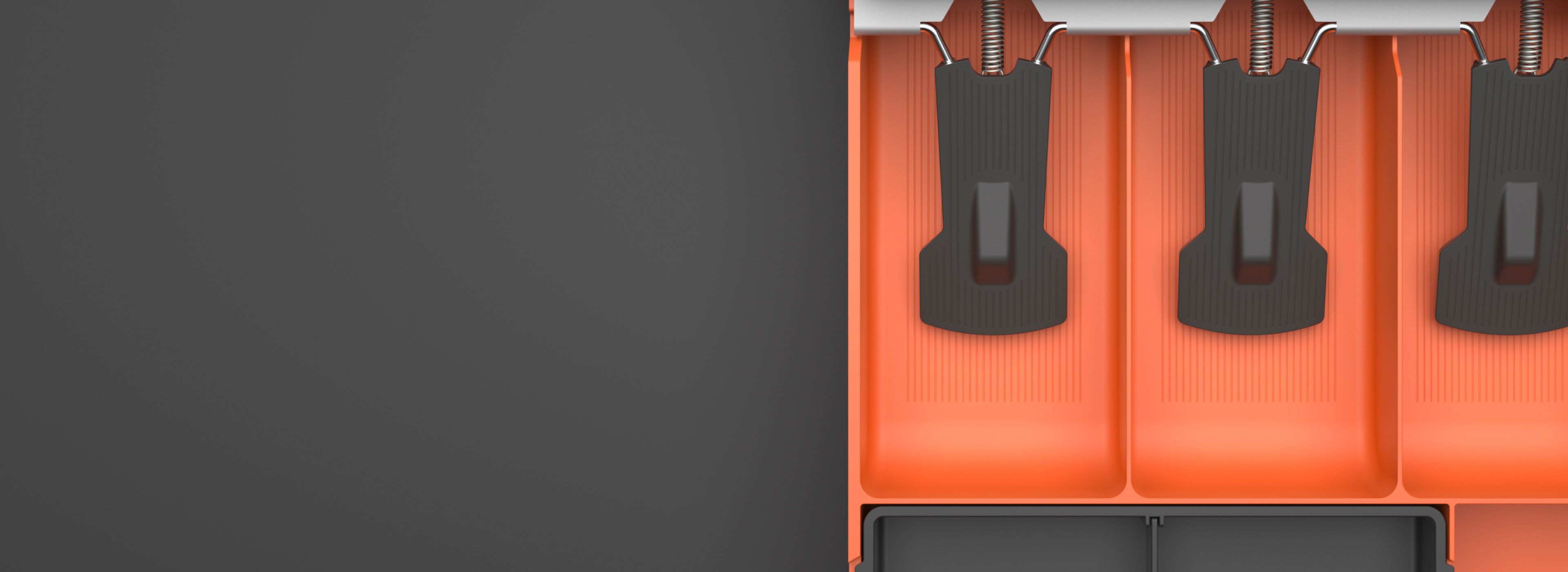 Two reinforced metallic clips, sheathed in durable orange ABS, inside the Sunmi cash drawer to minimize operating noise.
